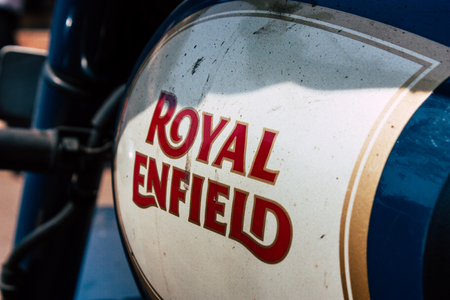 Gokarna Karnataka India February 13, 2019 Closeup of a Royal Enfield motorcycle parked in main road of Gokarna town in the morningのeditorial素材