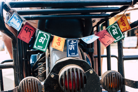 Gokarna Karnataka India February 13, 2019 Closeup of a Royal Enfield motorcycle parked in main road of Gokarna town in the morningのeditorial素材