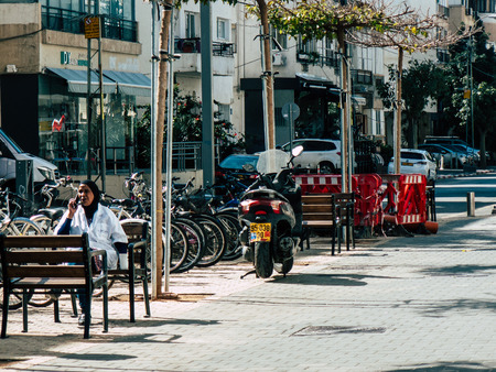 Tel Aviv Israel February 20, 2019 View of unknown Israeli people sitting in the streets of Tel Aviv...