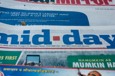 Mumbai India March 2, 2019 Closeup of traditional newspapers sold in the streets of Mumbai in the morningのeditorial素材