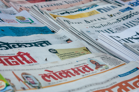 Mumbai India March 2, 2019 Closeup of traditional newspapers sold in the streets of Mumbai in the morningのeditorial素材