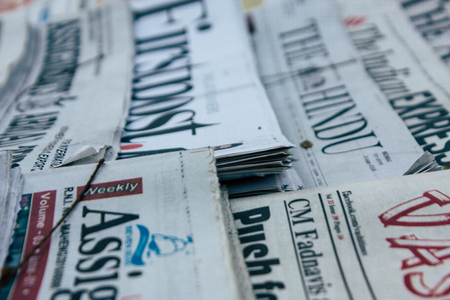 Mumbai India March 2, 2019 Closeup of traditional newspapers sold in the streets of Mumbai in the morningのeditorial素材