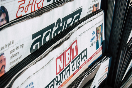 Mumbai India March 2, 2019 Closeup of traditional newspapers sold in the streets of Mumbai in the morningのeditorial素材