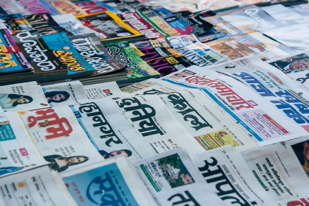 Mumbai India March 2, 2019 Closeup of traditional newspapers sold in the streets of Mumbai in the morningのeditorial素材