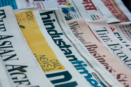 Mumbai India March 2, 2019 Closeup of traditional newspapers sold in the streets of Mumbai in the morningのeditorial素材
