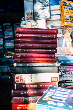 Mumbai India March 3, 2019 Closeup of various second hand books sold in the streets of Mumbai in the afternoonのeditorial素材