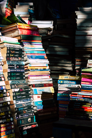 Mumbai India March 3, 2019 Closeup of various second hand books sold in the streets of Mumbai in the...