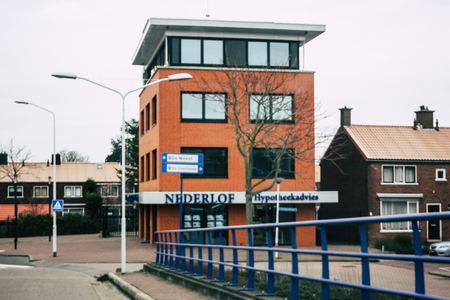 Papendrecht Netherlands March 12, 2019 View of the traditional Dutch lower brick building located in the streets of Papendrecht in the afternoonのeditorial素材
