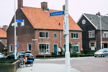 Papendrecht Netherlands March 12, 2019 View of the traditional Dutch lower brick building located in the streets of Papendrecht in the afternoonのeditorial素材