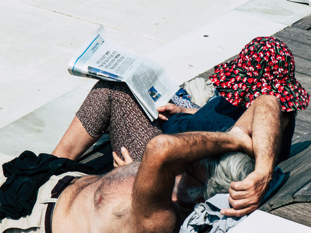 Tel Aviv Israel March 26, 2019 View of unknown Israeli people having fun on the beach of Tel Aviv in the afternoonのeditorial素材