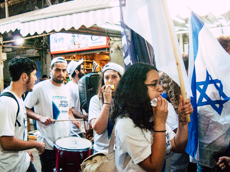 Tel Aviv Israel April 4, 2019 View of Israeli pro national protester walking the streets of Tel Aviv in the afternoonのeditorial素材