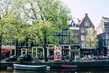 Amsterdam Netherlands April 8, 2019 View of the facade of a old Dutch building located in the Red Light quarter in Amsterdam in the eveningのeditorial素材