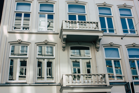 Amsterdam Netherlands April 8, 2019 View of the facade of a old Dutch building located in the Red...
