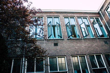 Amsterdam Netherlands April 8, 2019 View of the facade of a old Dutch building located in the Red...