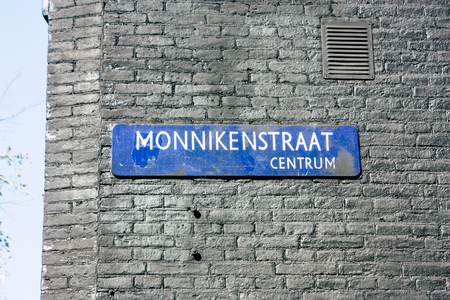 Amsterdam Netherlands April 8, 2019 View of the facade of a old Dutch building located in the Red Light quarter in Amsterdam in the eveningのeditorial素材