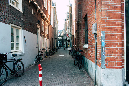 Amsterdam Netherlands April 8, 2019 View of unknowns people walking in the Red Light district in Amsterdam in the eveningのeditorial素材