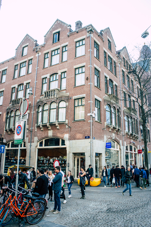 Amsterdam Netherlands April 8, 2019 View of unknowns people walking in the Red Light district in Amsterdam in the eveningのeditorial素材