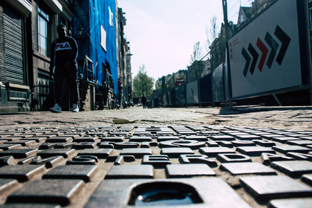 Amsterdam Netherlands April 8, 2019 View of unknowns people walking in the Red Light district in Amsterdam in the eveningのeditorial素材