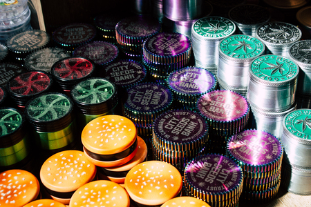Amsterdam Netherlands April 10, 2019 Closeup of decoratives objects about cannabis sold in a traditional souvenirs shop at the Red Light district of Amsterdam in the morningのeditorial素材
