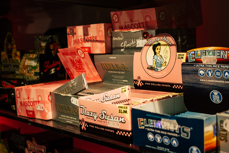 Amsterdam Netherlands April 10, 2019 Closeup of decoratives objects about cannabis sold in a traditional souvenirs shop at the Red Light district of Amsterdam in the morningのeditorial素材