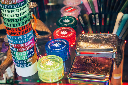 Amsterdam Netherlands April 10, 2019 Closeup of decoratives objects about cannabis sold in a traditional souvenirs shop at the Red Light district of Amsterdam in the morningのeditorial素材