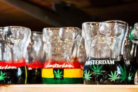 Closeup of decorative objects about cannabis sold in a traditional souvenirs shop at the Red Light...