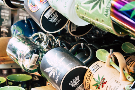 Amsterdam Netherlands April 10, 2019 Closeup of decoratives objects about cannabis sold in a traditional souvenirs shop at the Red Light district of Amsterdam in the morningのeditorial素材