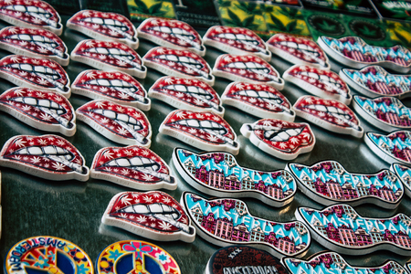 Closeup of decorative objects about cannabis sold in a traditional souvenirs shop at the Red Light district of Amsterdam in the morningの写真素材