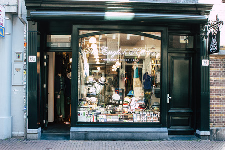 Amsterdam Netherlands April 10, 2019 View of a store located in Nieuwe Hoogstraat street in Amsterdam in the eveningのeditorial素材