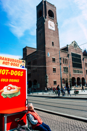 Amsterdam Netherlands April 10, 2019 View of the streets of Amsterdam in the old district near Central station in the eveningのeditorial素材