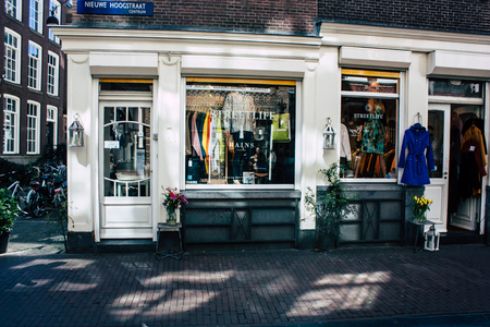 Amsterdam Netherlands April 10, 2019 View of a store located in Nieuwe Hoogstraat street in Amsterdam in the eveningのeditorial素材