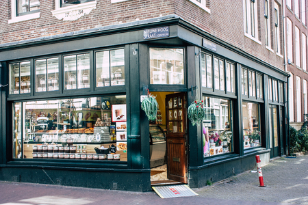 Amsterdam Netherlands April 10, 2019 View of a store located in Nieuwe Hoogstraat street in Amsterdam in the eveningのeditorial素材