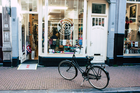 Amsterdam Netherlands April 10, 2019 View of a store located in Nieuwe Hoogstraat street in Amsterdam in the eveningのeditorial素材