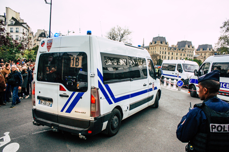 Paris France April 16, 2019 View of a French police car near the Notre Dame cathedral in Paris the day after the big fire in the afternoonのeditorial素材