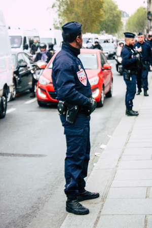 Paris France April 16, 2019  View of police officers who secure the street front the Notre Dame cathedral which burned the day before in a big fire in the afternoonのeditorial素材