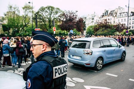 Paris France April 16, 2019  View of police officers who secure the street front the Notre Dame...