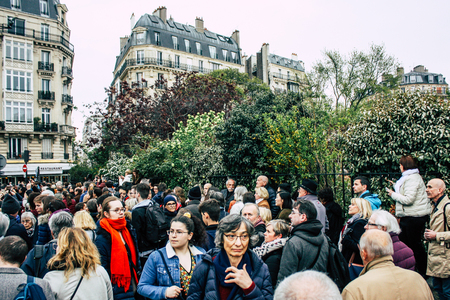 Paris France April 16, 2019  View of Parisians and tourists come to see the Notre Dame cathedral which burned the day before in a big fireのeditorial素材