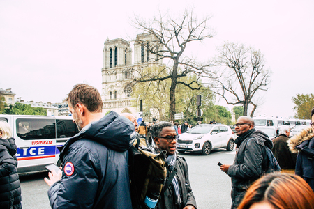 Paris France April 16, 2019  View of Parisians and tourists come to see the Notre Dame cathedral which burned the day before in a big fireのeditorial素材