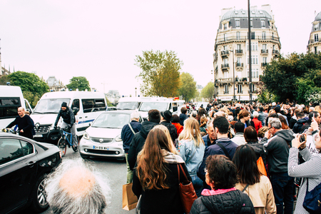 Paris France April 16, 2019  View of Parisians and tourists come to see the Notre Dame cathedral which burned the day before in a big fireのeditorial素材
