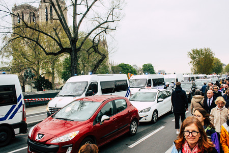 Paris France April 16, 2019  View of Parisians and tourists come to see the Notre Dame cathedral which burned the day before in a big fireのeditorial素材