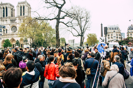 Paris France April 16, 2019  View of Parisians and tourists come to see the Notre Dame cathedral which burned the day before in a big fireのeditorial素材