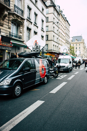 Paris France April 16, 2019 View of journalist car parked front the Notre Dame cathedral which burned the day before in a big fireのeditorial素材
