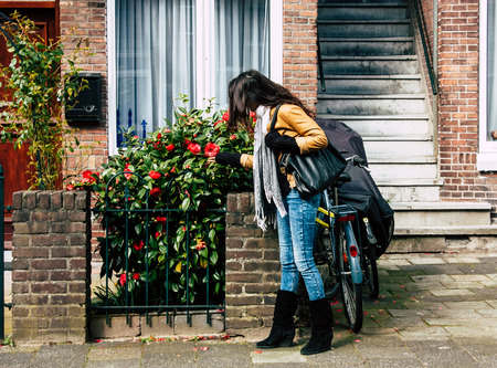 Voorburg Netherlands March 19, 2019 Portrait of Reachel Singh, Dutch professional singer and songwriter walking in the streets of Voorburg in the afternoonのeditorial素材
