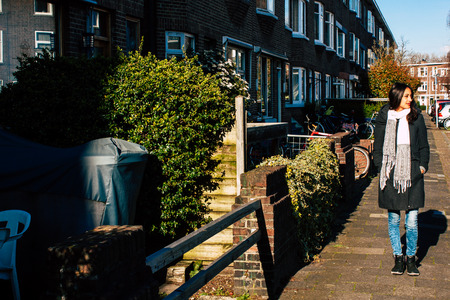 Voorburg Netherlands March 19, 2019 Portrait of Reachel Singh, Dutch professional singer and songwriter walking in the streets of Voorburg in the afternoonのeditorial素材