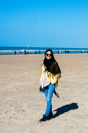 Scheveningen Netherlands March 22, 2019 Portrait of Reachel Singh, Dutch professional songwriter and singer having fun on the beach of Scheveningen near The Hague in Netherlands in the afternoonのeditorial素材