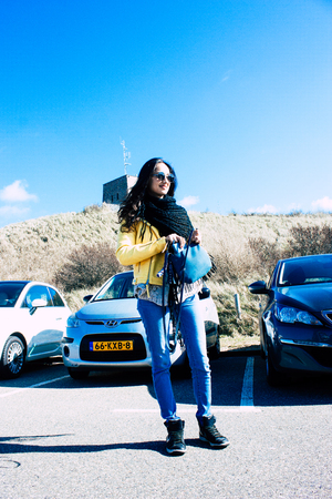 Scheveningen Netherlands March 22, 2019 Portrait of Reachel Singh, Dutch professional songwriter and singer having fun on the beach of Scheveningen near The Hague in Netherlands in the afternoonのeditorial素材