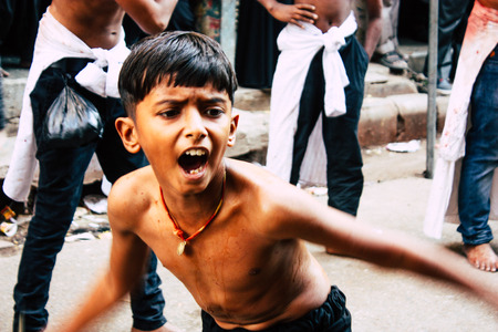 Varanasi India November 17, 2018 View of unknowns Shiite  Muslims use chains and blades during ritual self flagellation as part of the Imam Husain celebration, Ashura commemorations in the Arabian district of Varanasi in the morningのeditorial素材