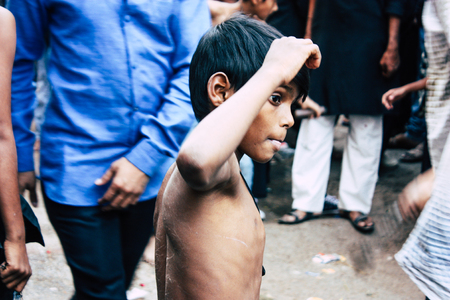 Varanasi India November 17, 2018 View of unknowns Shiite  Muslims use chains and blades during ritual self flagellation as part of the Imam Husain celebration, Ashura commemorations in the Arabian district of Varanasi in the morningのeditorial素材
