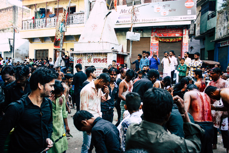Varanasi India November 17, 2018 View of unknowns Shiite  Muslims use chains and blades during ritual self flagellation as part of the Imam Husain celebration, Ashura commemorations in the Arabian district of Varanasi in the morningのeditorial素材