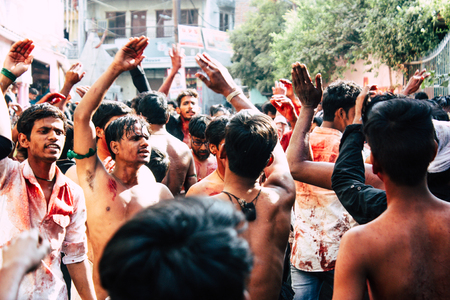 Varanasi India November 17, 2018 View of unknowns Shiite  Muslims use chains and blades during ritual self flagellation as part of the Imam Husain celebration, Ashura commemorations in the Arabian district of Varanasi in the morningのeditorial素材